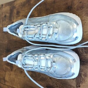 Michael Kors upscale tennis shoes.  Silver color.  Size 7.5M.